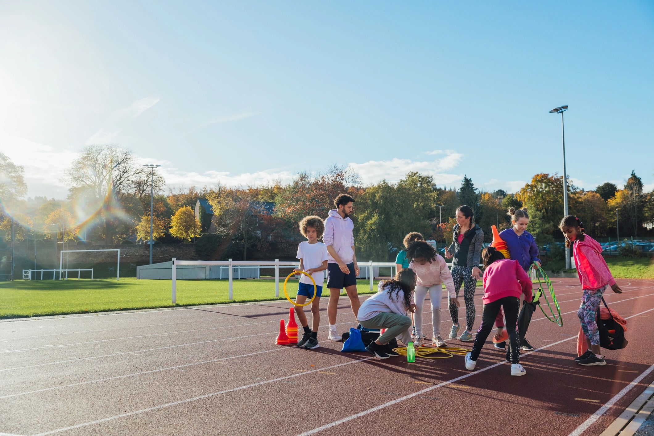 Youth athletes preparing together before training