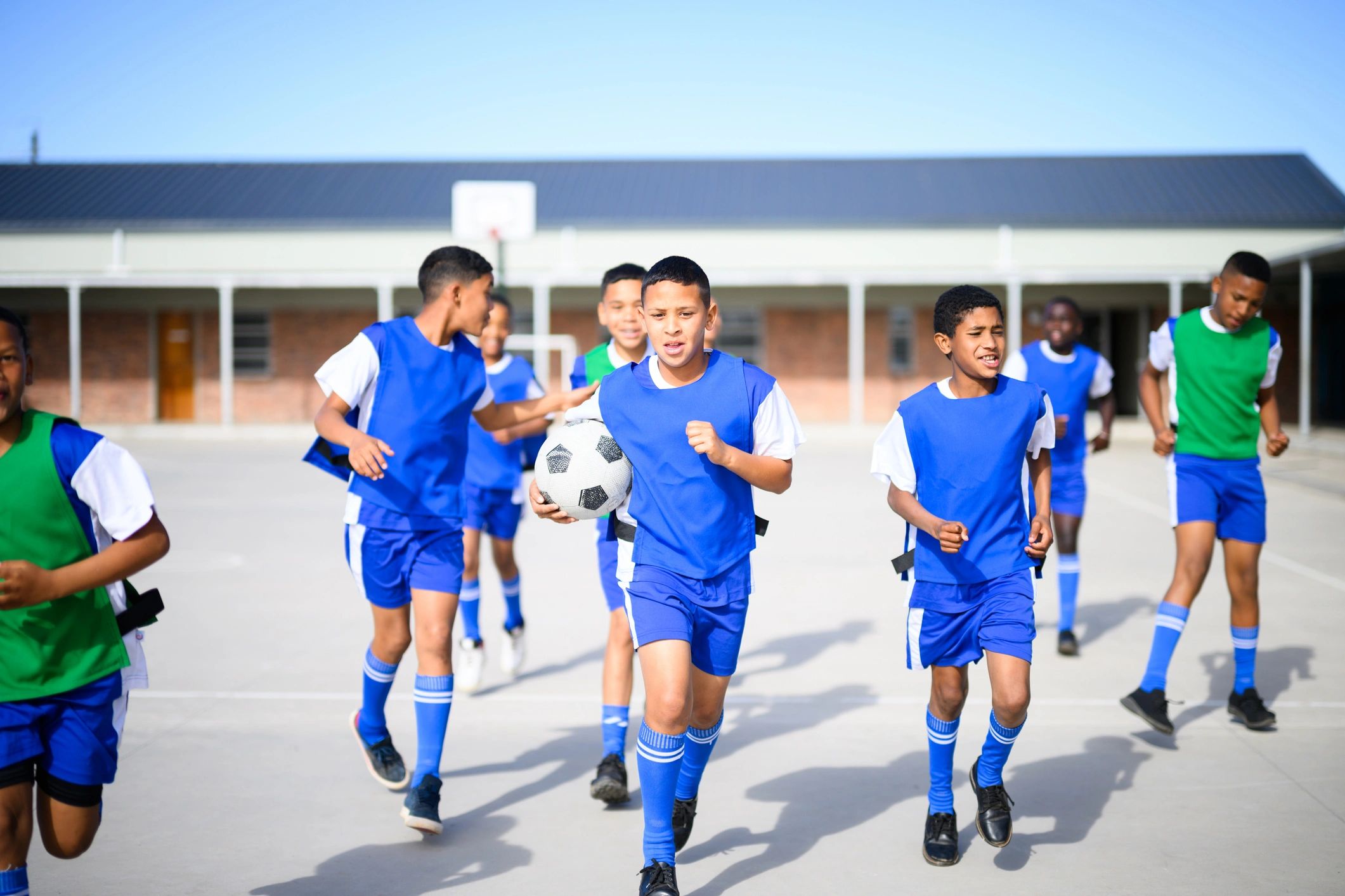 Youth soccer players warming up at camp